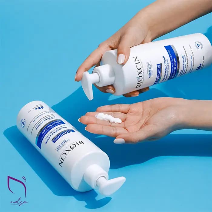 کرم مرطوب‌کننده بیوکسین مدل Atopicare مخصوص پوست حساس (500 میل)